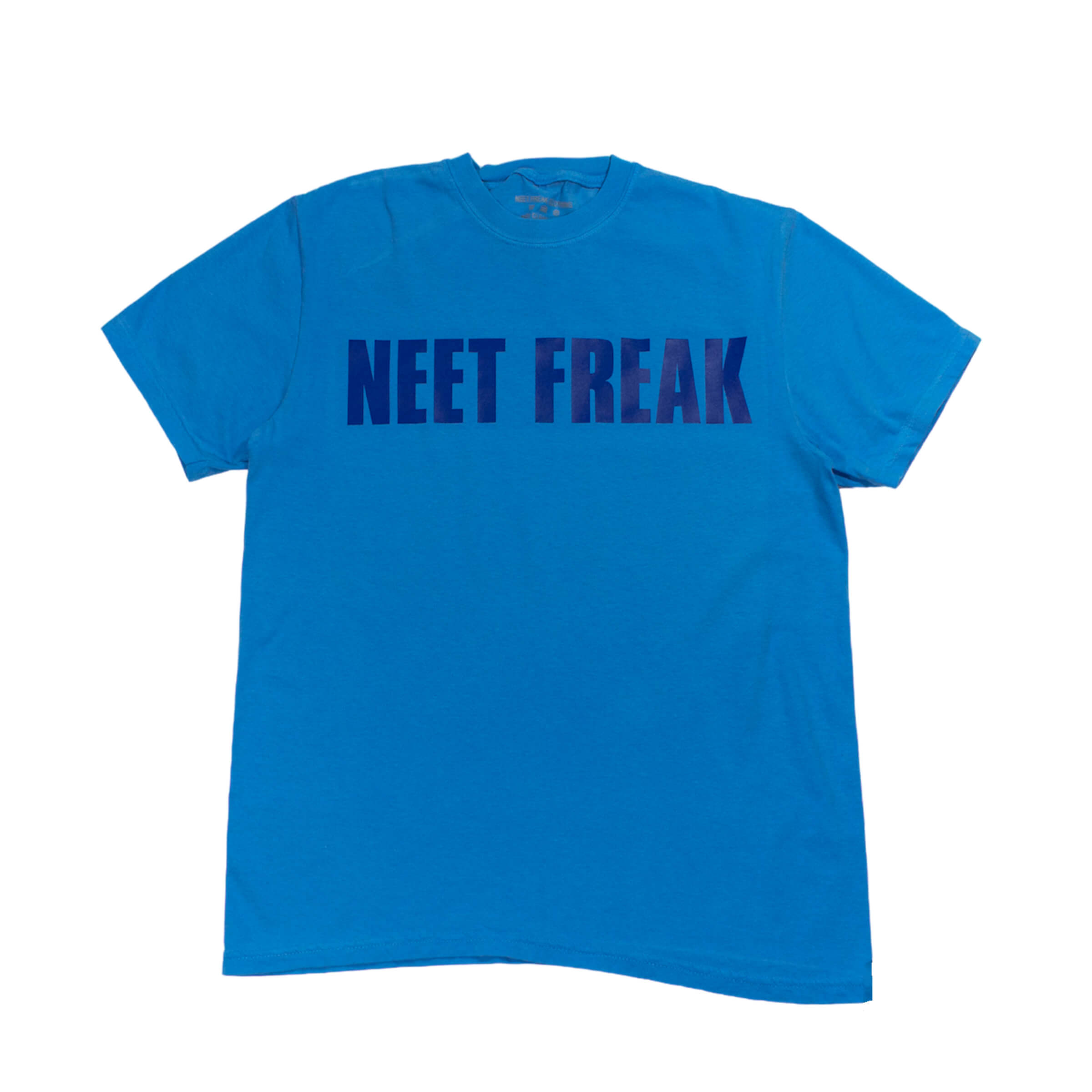 The Standard Neet Freak T-shirt in Blue. Close-up of a premium, heavyweight 6.1 oz, 100% ring-spun cotton t-shirt with a soft, garment-dyed finish. The image emphasizes the rich color and soft texture of the fabric.