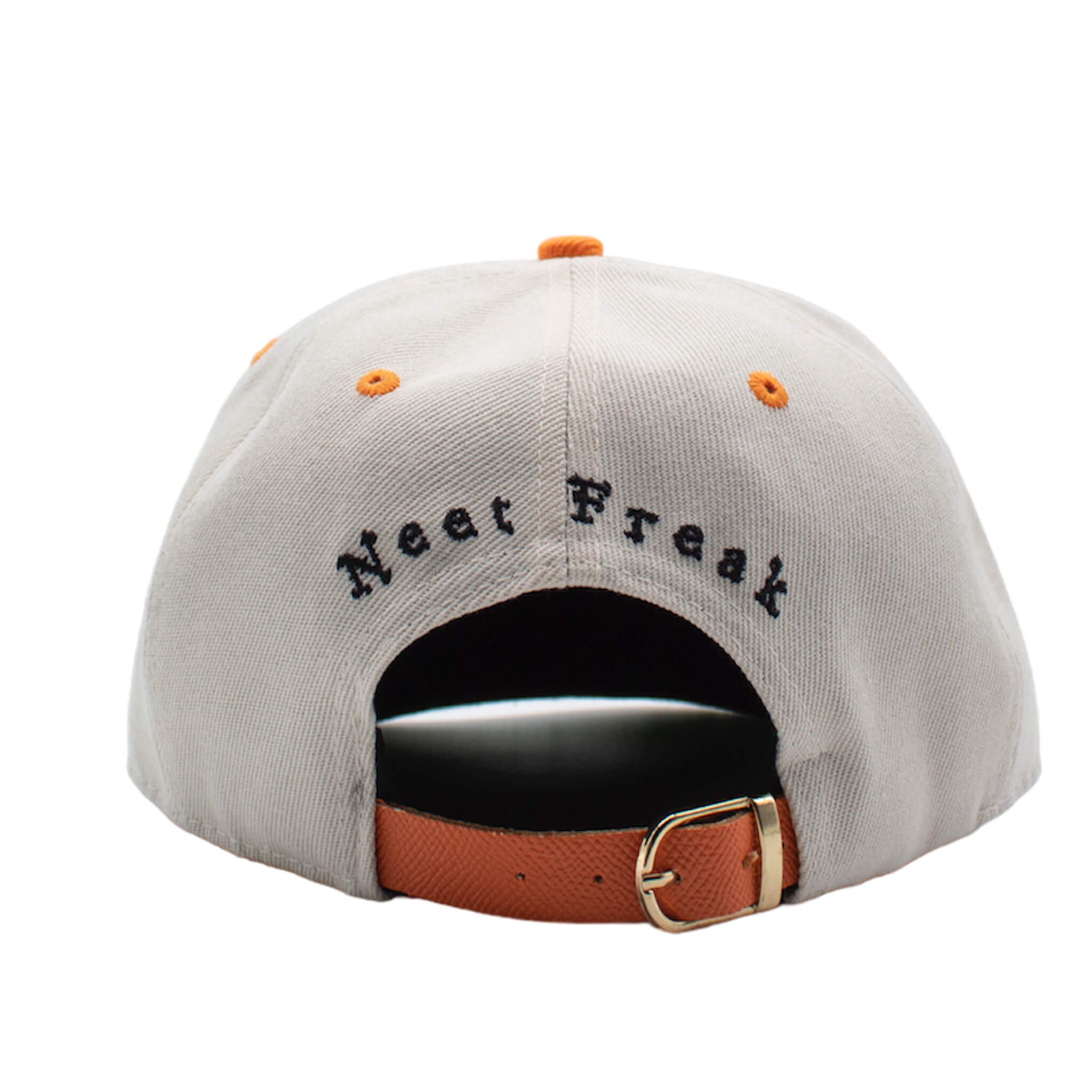 Back of Orange premium high-profile hat with 3D embroidery, a green under-brim, a navy blue satin lining for hair protection, and an adjustable leather strap.