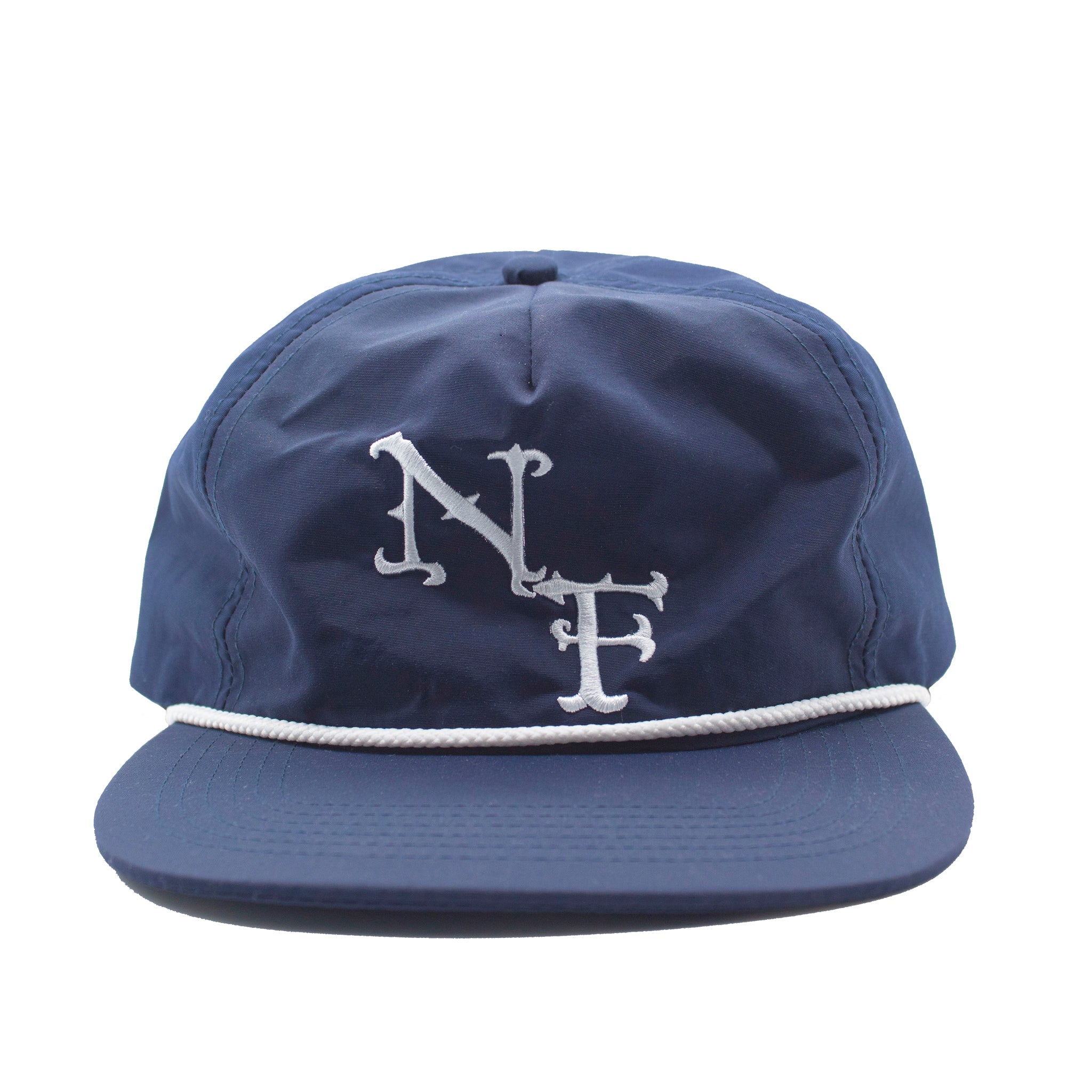 Front of Navy blue 100% nylon unstructured snapback hat featuring a subtle, embroidered 'NF' logo on the front.