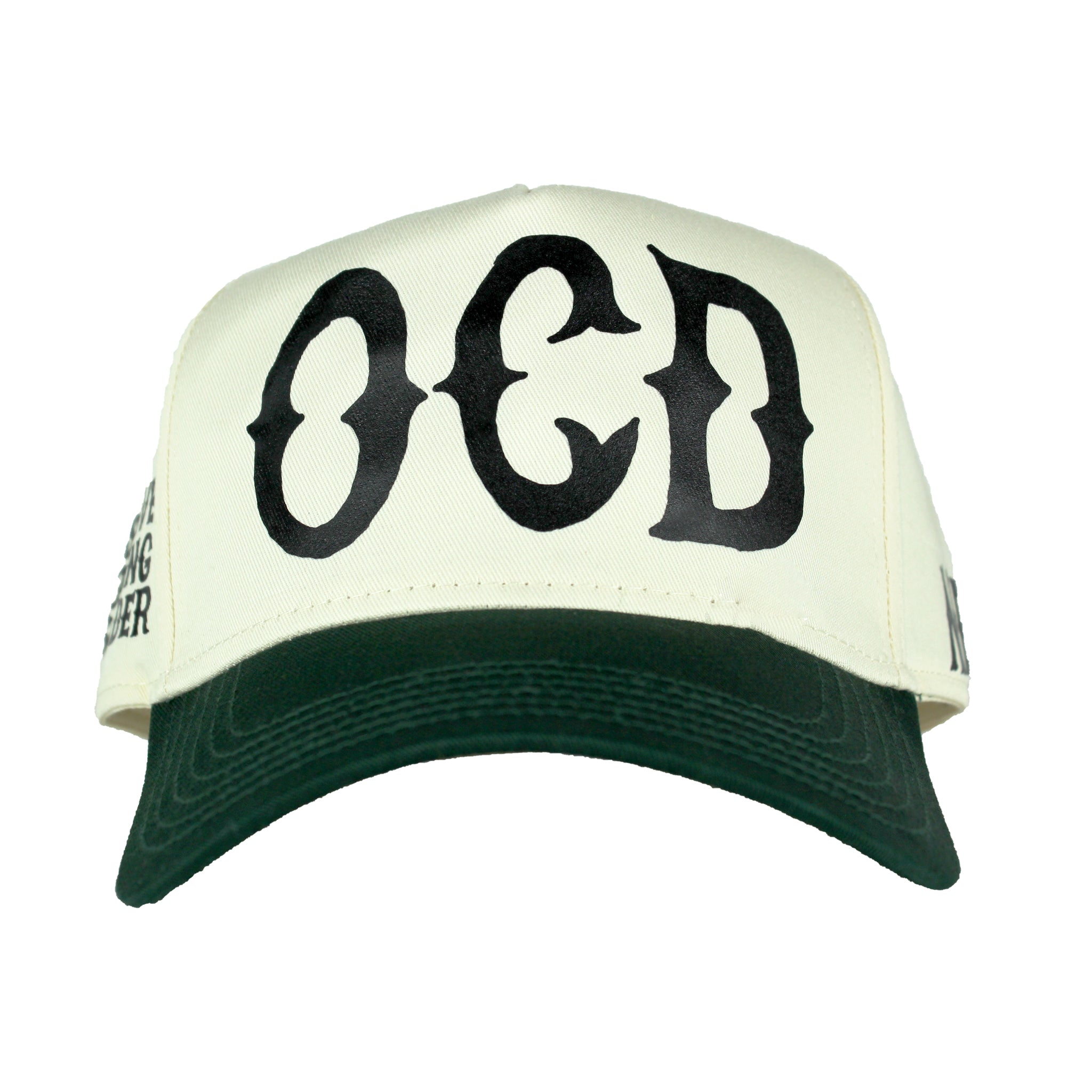 Front of Premium dark green and natural trucker hat with black printed 'OCD' acronym, symbolizing Obsessive Clothing Disorder.
