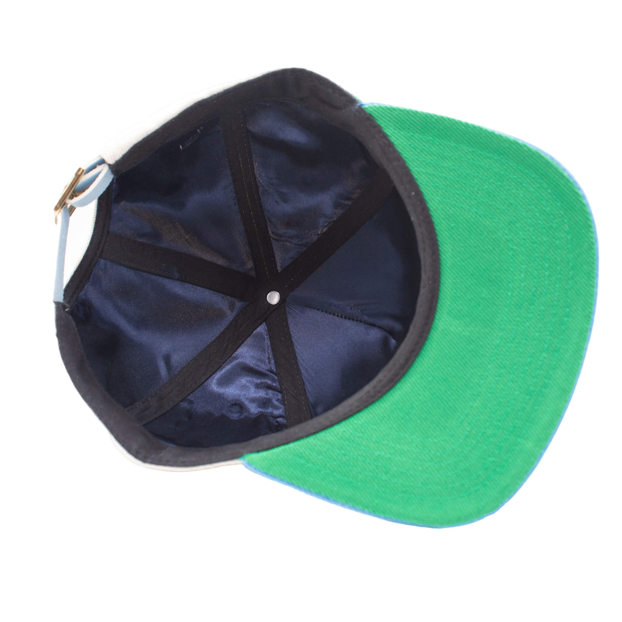 Inside view of Blue premium high-profile hat with 3D embroidery, a green under-brim, a navy blue satin lining for hair protection, and an adjustable leather strap.